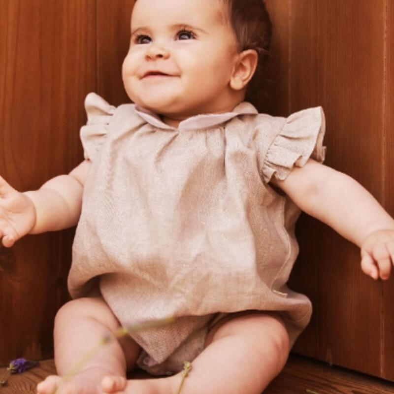 baby in premium european linen romper